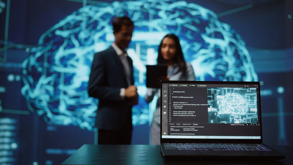 Laptop displaying AI code and neural network visuals with professionals in the background, illustrating the Nearshore vs Offshore decision for hiring AI-ready React talent.