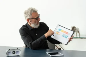 Executive analyzing React.js ROI Measurement metrics on a digital dashboard to evaluate performance and business impact